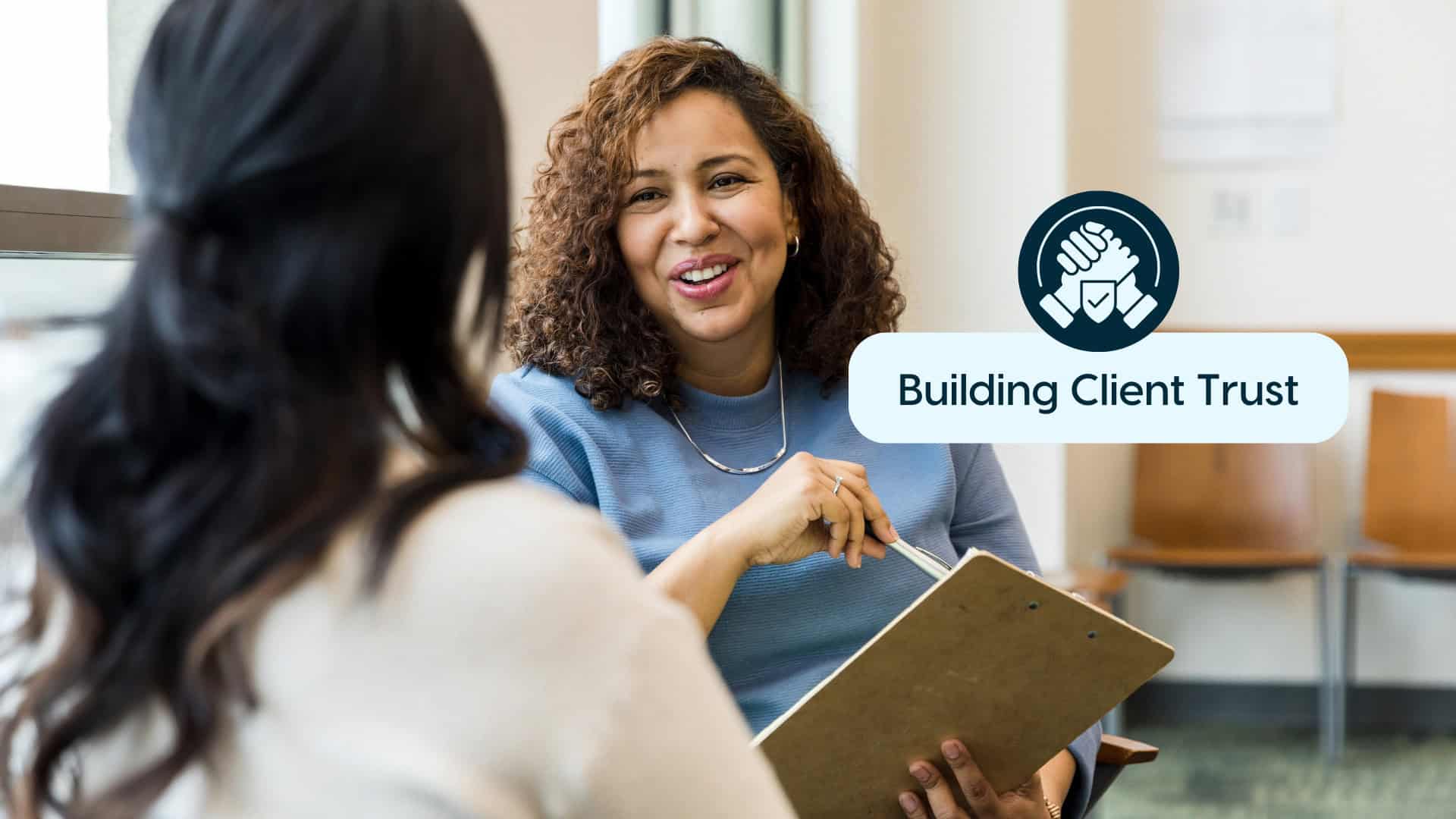 Building Client Trust in Insurance Two women discussing insurance and building client trust.