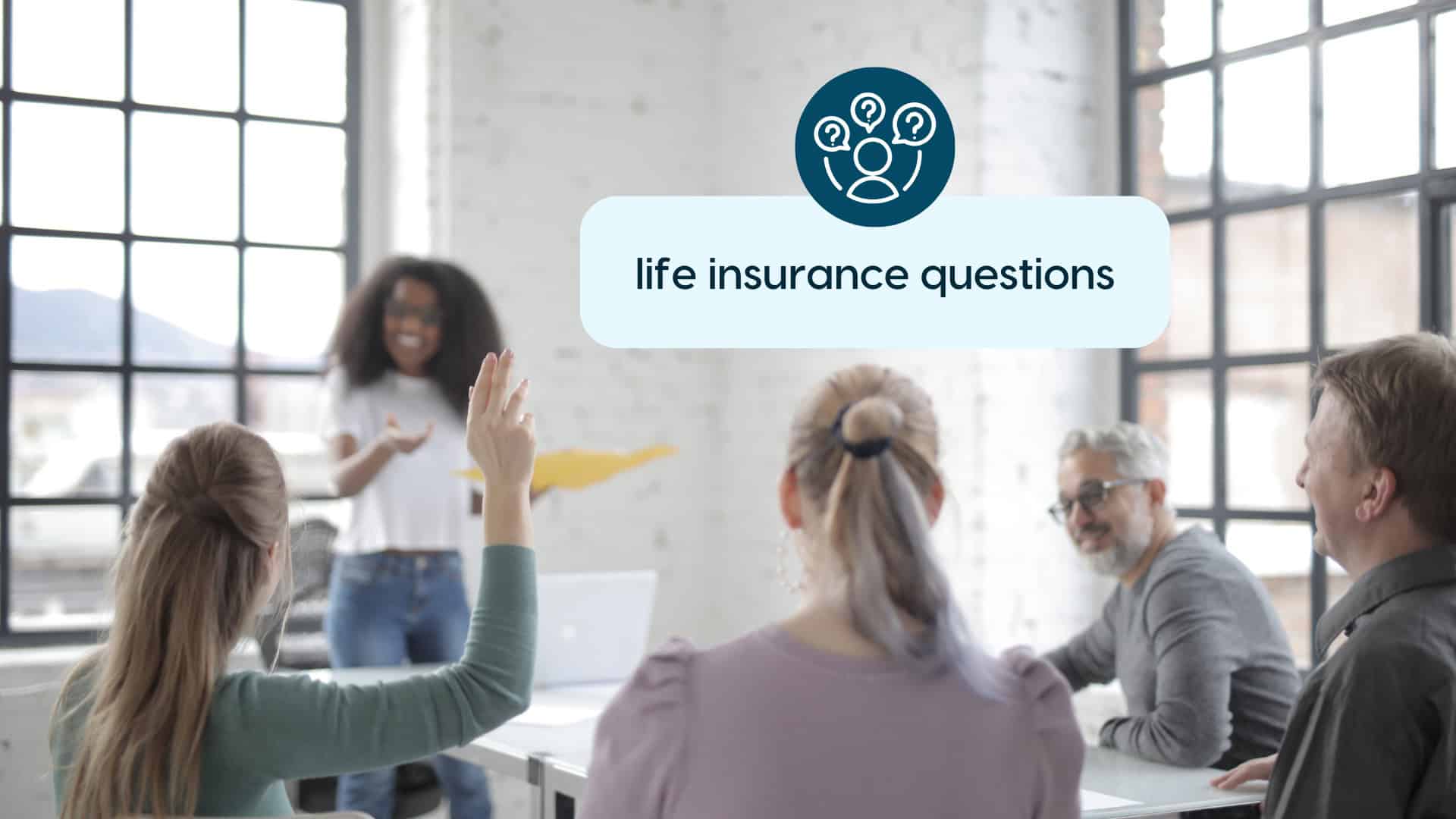 Life Insurance Questions for Policy Choice Group discussing life insurance questions in a meeting room.