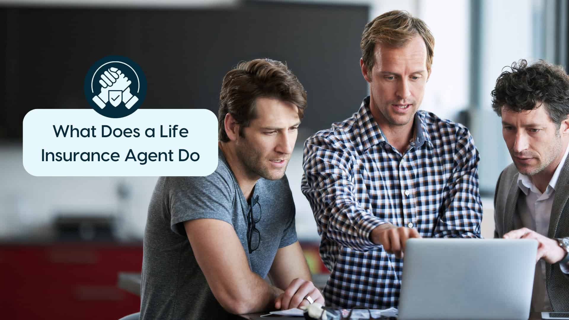 What Does a Life Insurance Agent Do? Group of men discussing life insurance with a laptop in an office setting.