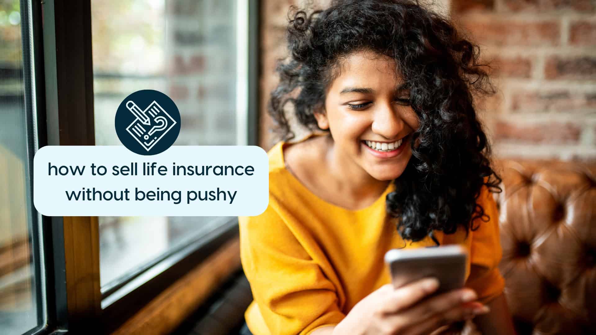 How Agents Sell Life Insurance Without Being Pushy Smiling woman using smartphone, promoting non-pushy life insurance sales.