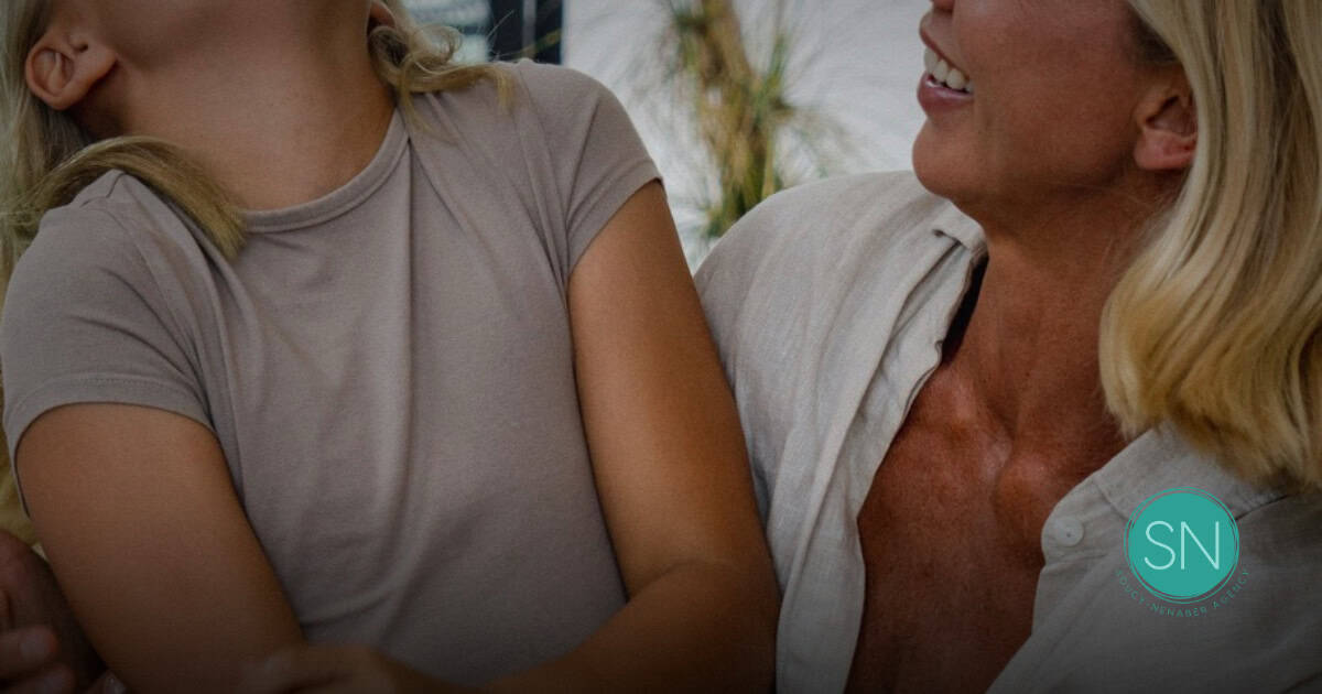 Women Discussing Life Insurance Mother and daughter talking about life insurance options.
